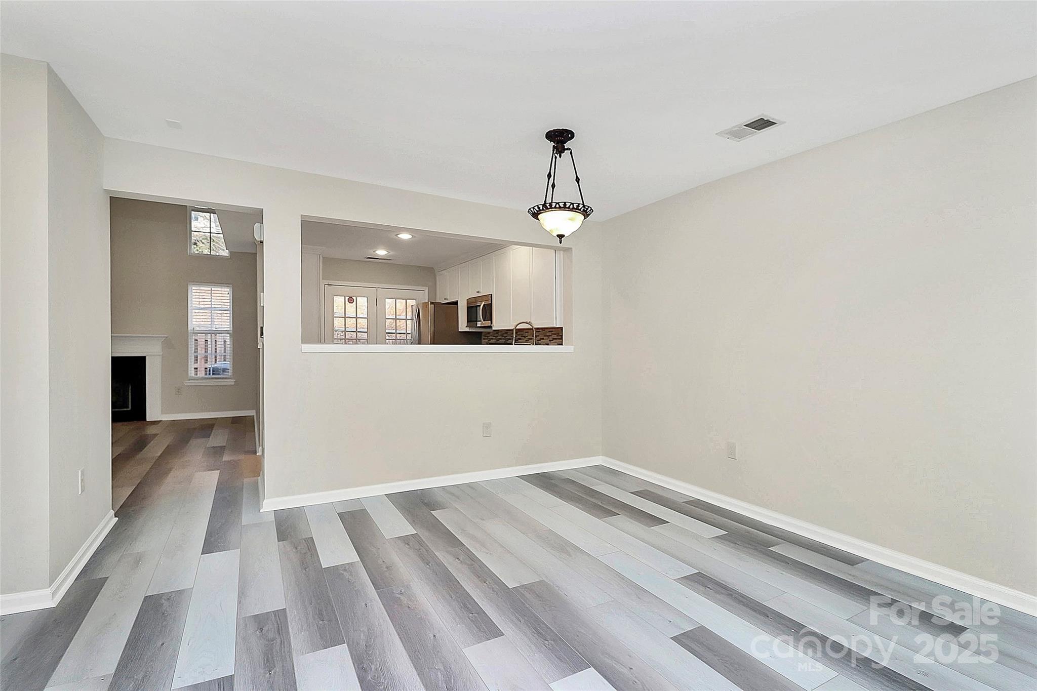 441 Robin Reed Court Pineville, NC 28134 - Photo 10 of 33 a view of a room with a hallway