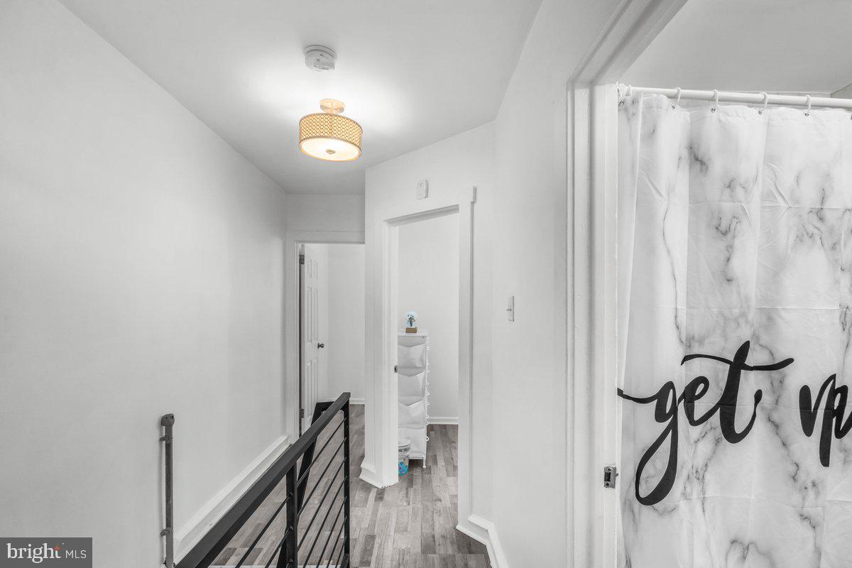 7734 Temple Road Philadelphia, PA 19150 - Photo 12 of 33 a bathroom with a bathtub and a shower