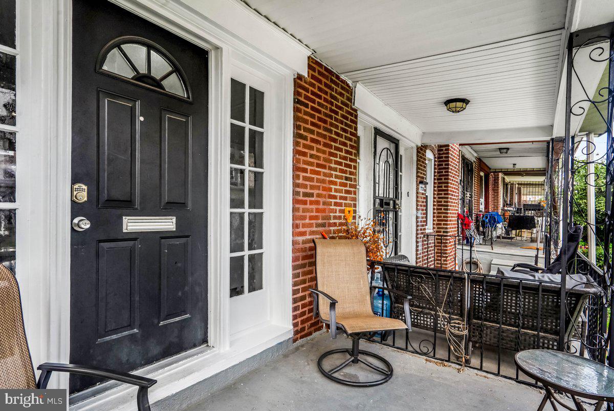 7734 Temple Road Philadelphia, PA 19150 - Photo 22 of 33 a front view of a house with patio