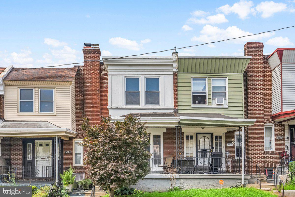 7734 Temple Road Philadelphia, PA 19150 - Photo 24 of 33 a front view of a house with garden