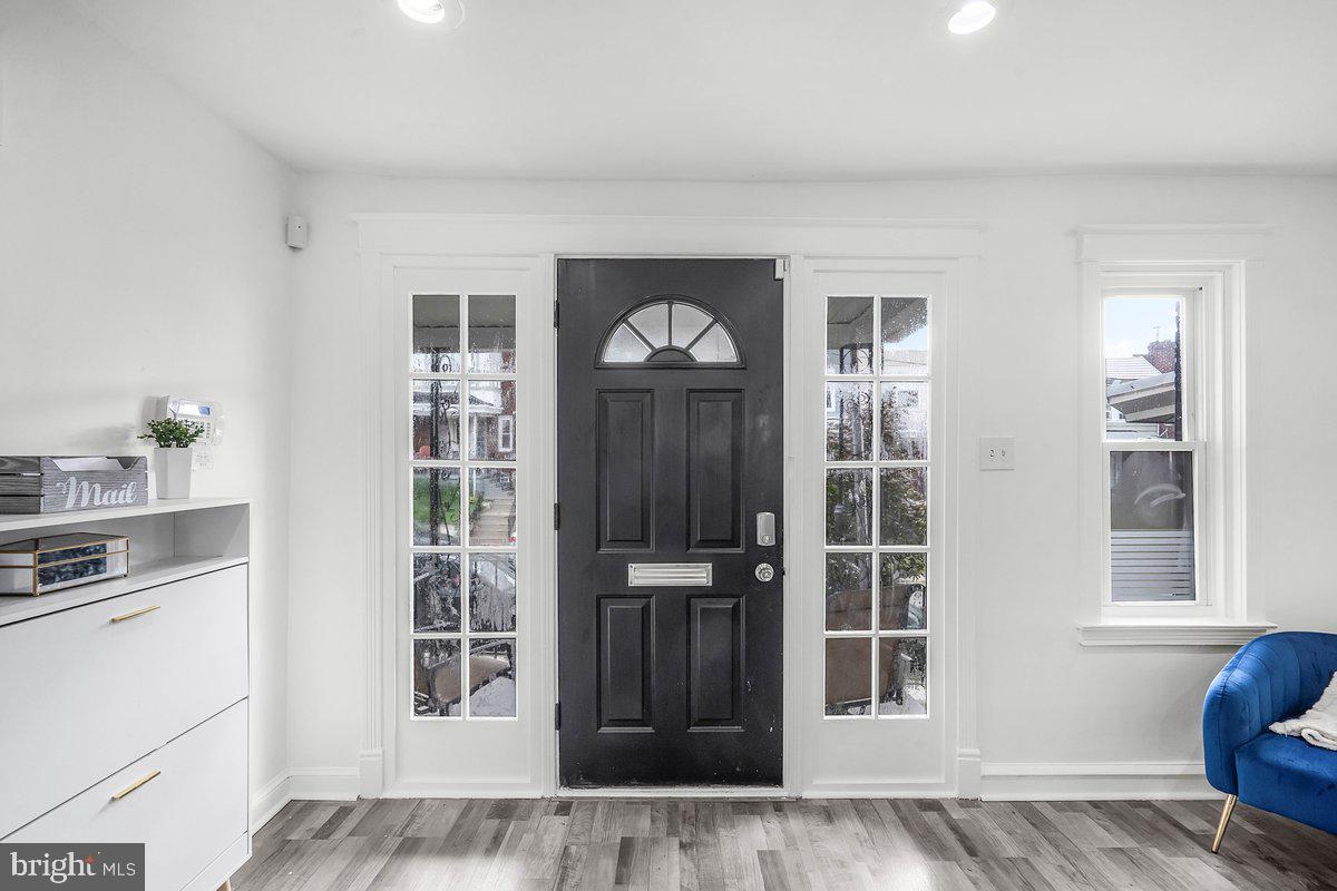 7734 Temple Road Philadelphia, PA 19150 - Photo 3 of 33 a view of an entryway of house and livingroom with wooden floor