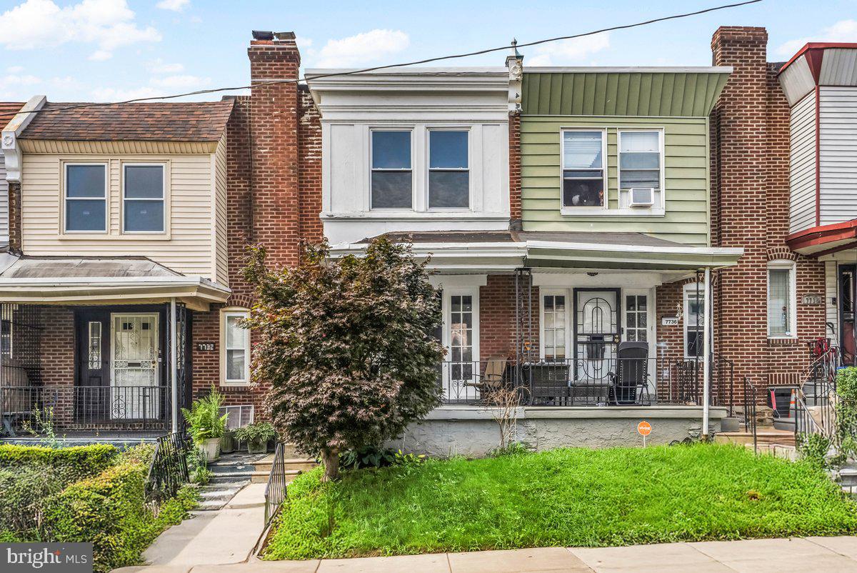 7734 Temple Road Philadelphia, PA 19150 - Photo 33 of 33 front view of a house with a yard