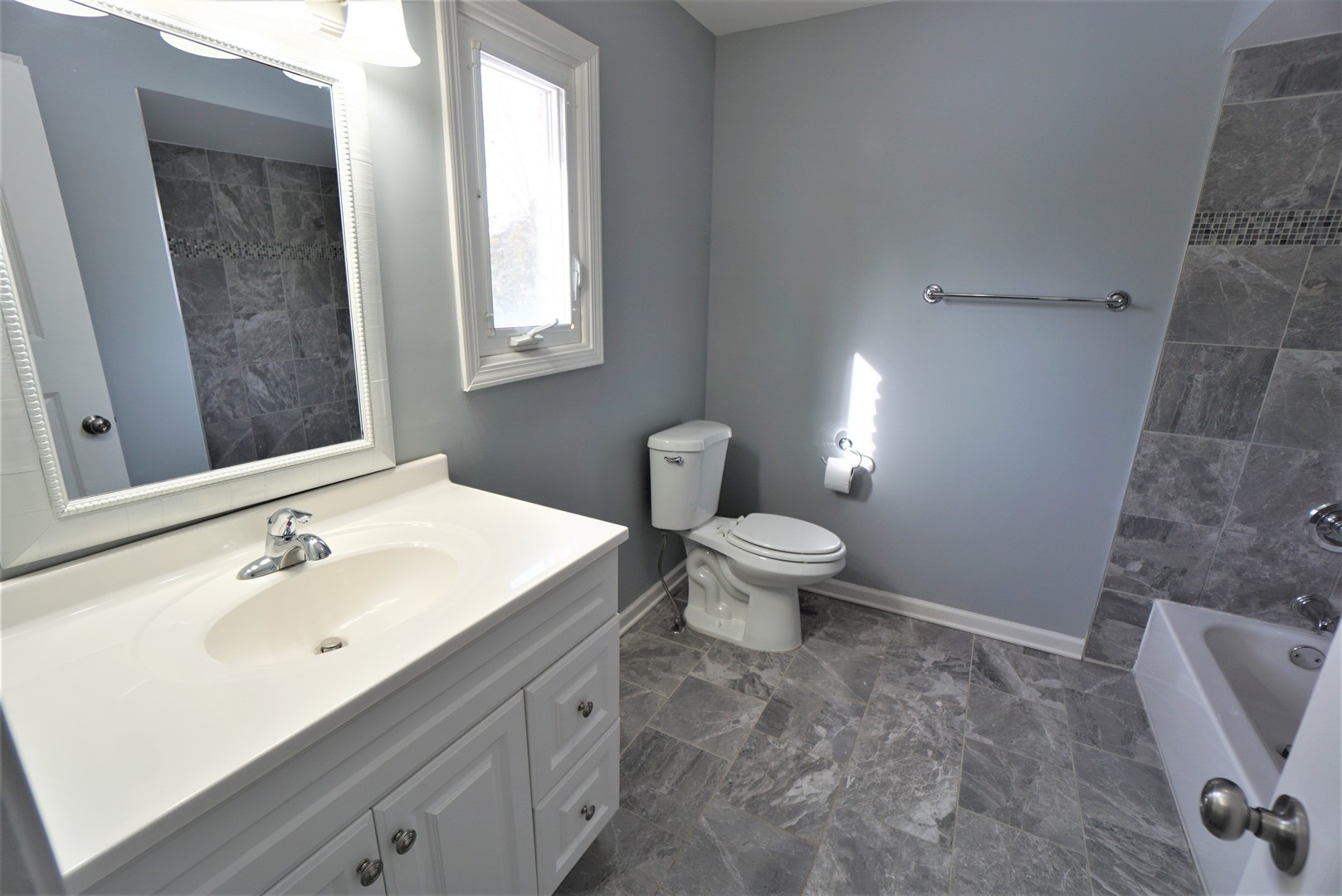 2842 Scott Crescent Flossmoor, IL 60422 - Photo 17 of 43 a bathroom with a sink a toilet and mirror