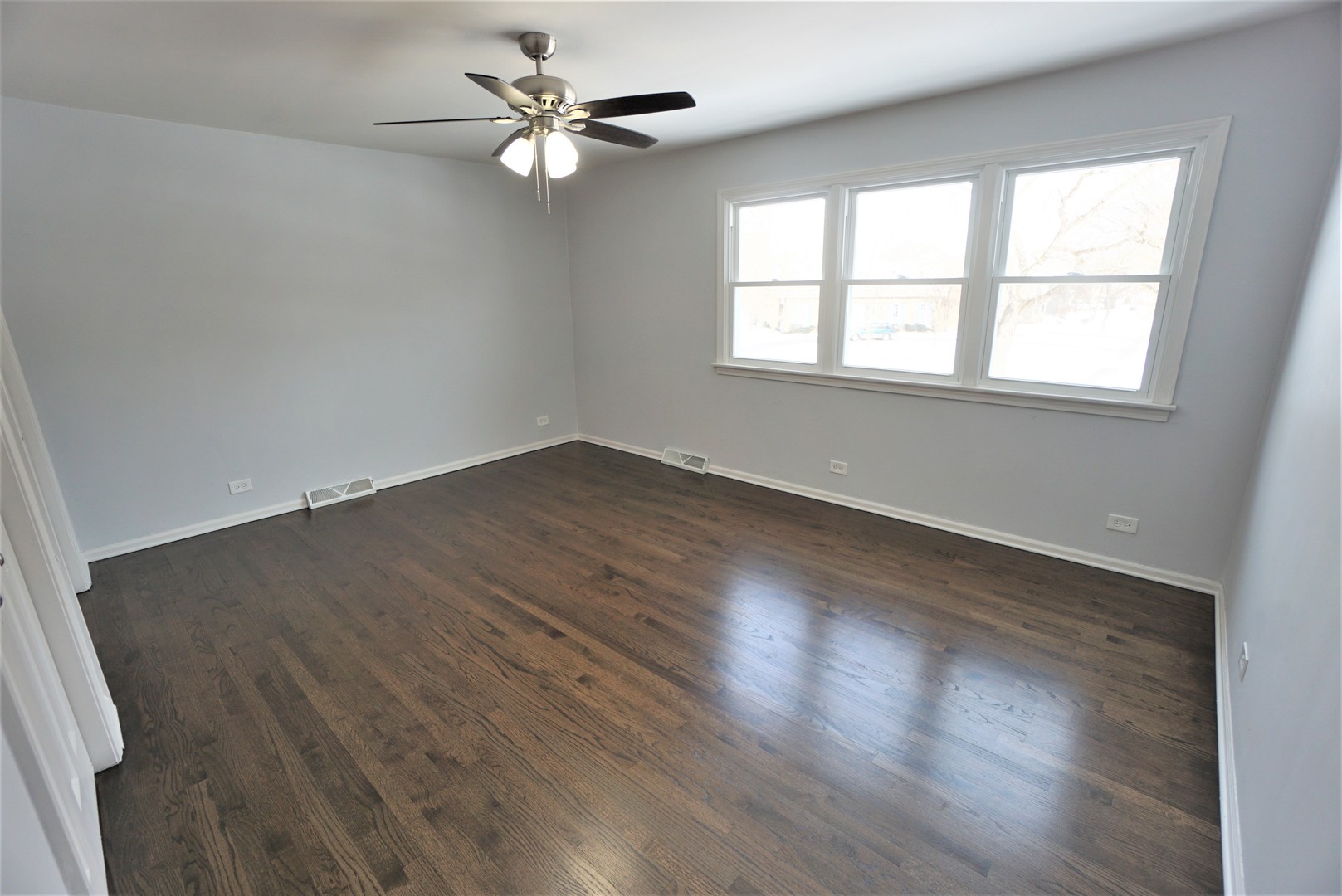 2842 Scott Crescent Flossmoor, IL 60422 - Photo 21 of 43 wooden floor in an empty room with a window