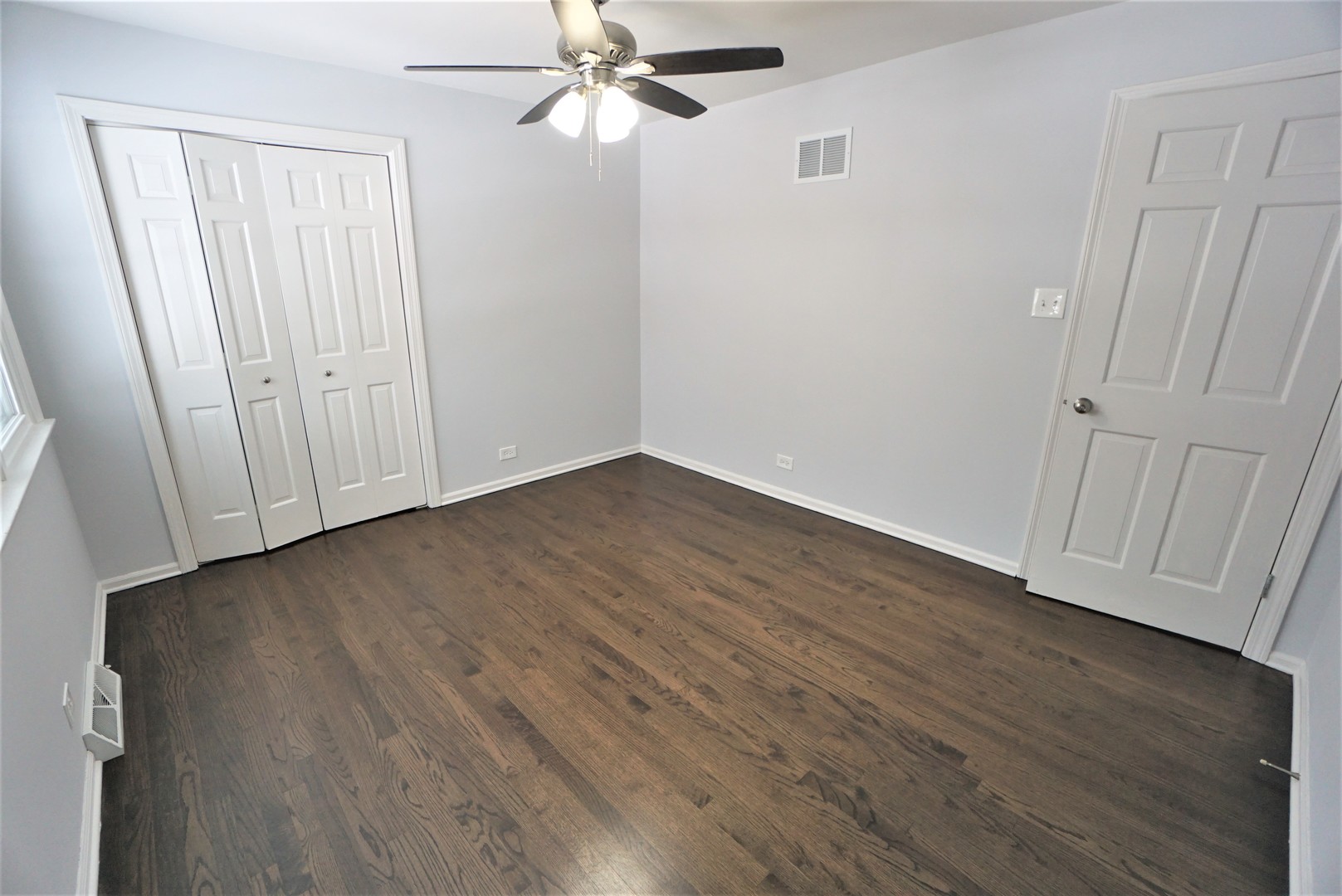 2842 Scott Crescent Flossmoor, IL 60422 - Photo 27 of 43 a view of an empty room with wooden floor