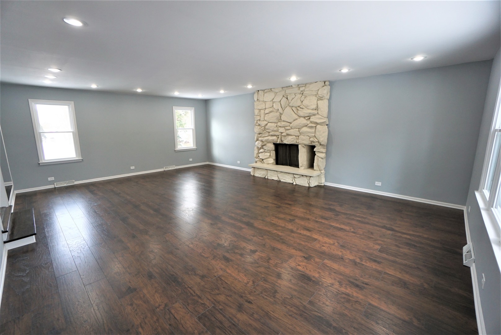 2842 Scott Crescent Flossmoor, IL 60422 - Photo 3 of 43 an empty room with wooden floor and fireplace