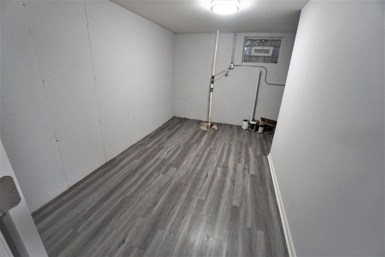 2842 Scott Crescent Flossmoor, IL 60422 - Photo 35 of 43 a view of a room with wooden floor and white walls