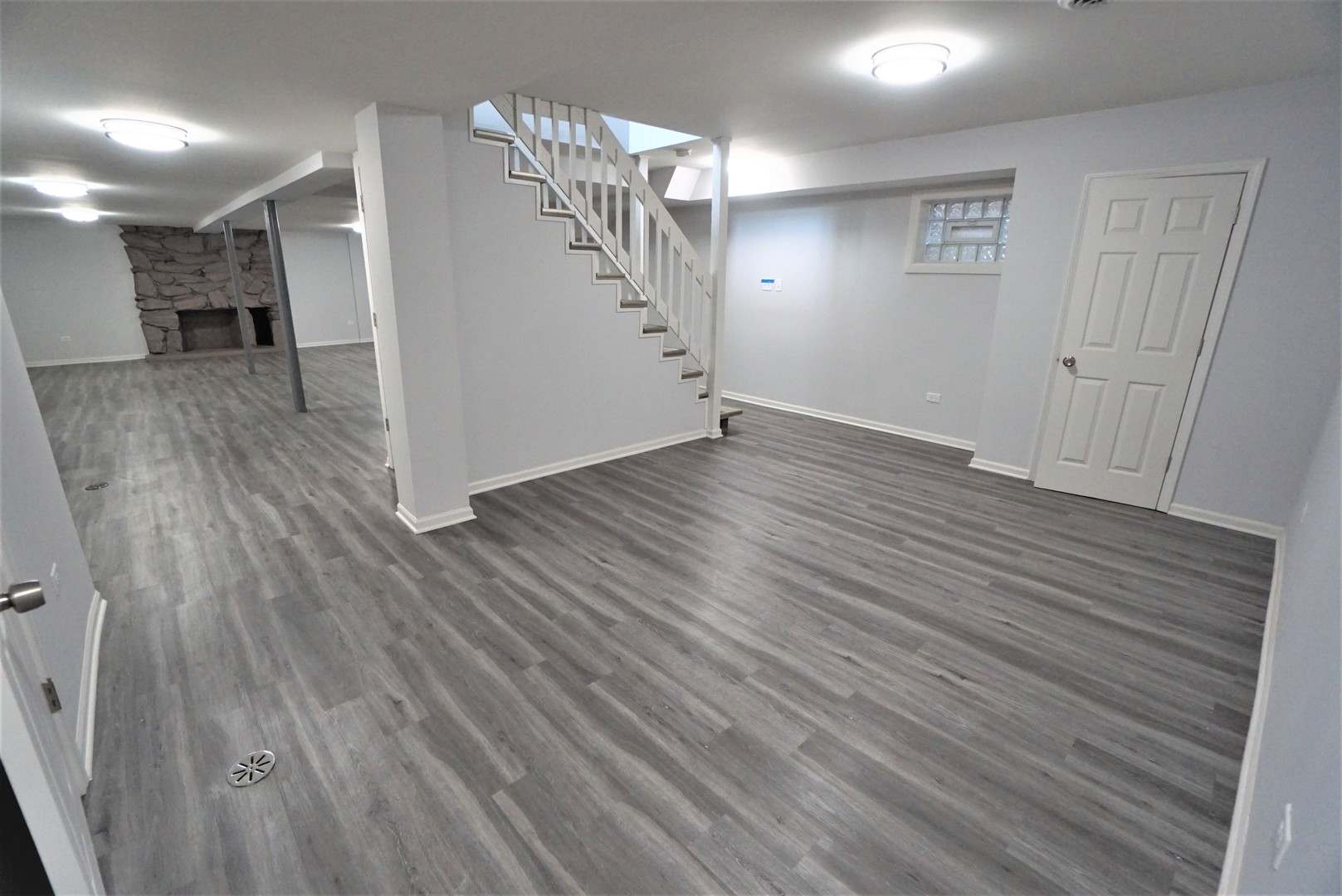 2842 Scott Crescent Flossmoor, IL 60422 - Photo 37 of 43 an empty room with wooden floor and staircase