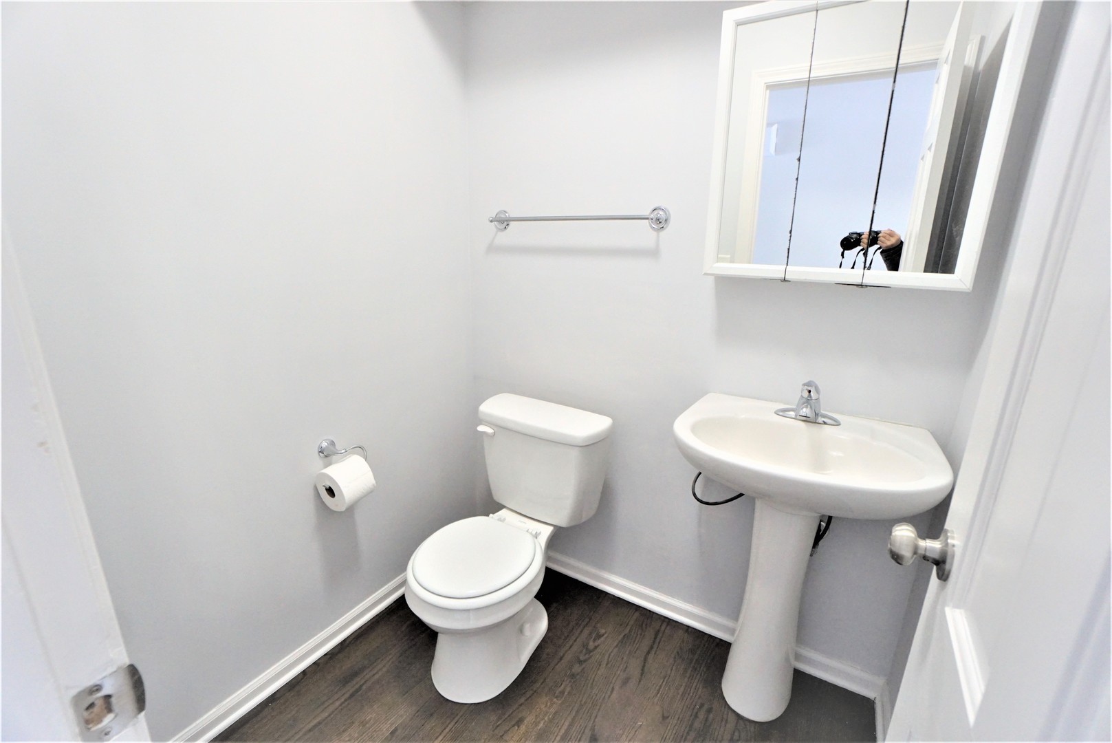 2842 Scott Crescent Flossmoor, IL 60422 - Photo 10 of 43 a white toilet sitting next to a bathroom sink