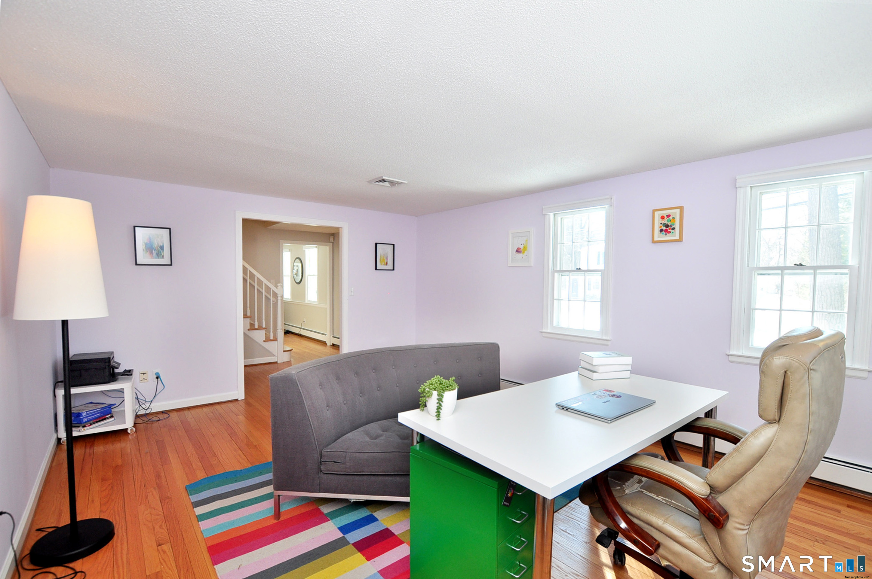 90 Seminary Road Simsbury, CT 06070 - Photo 15 of 34 a living room with furniture and a wooden floor