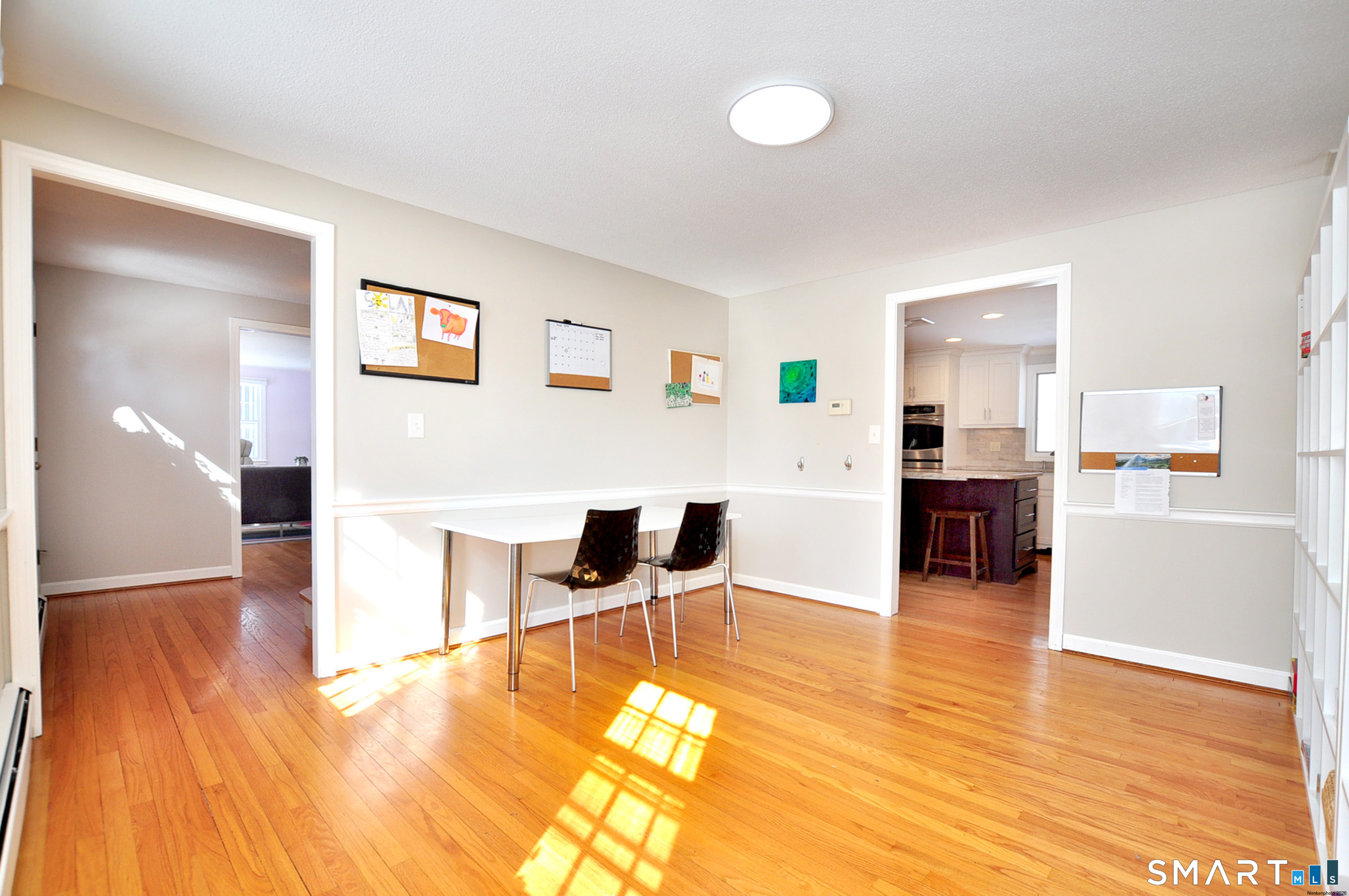90 Seminary Road Simsbury, CT 06070 - Photo 16 of 34 a living room with furniture and kitchen view