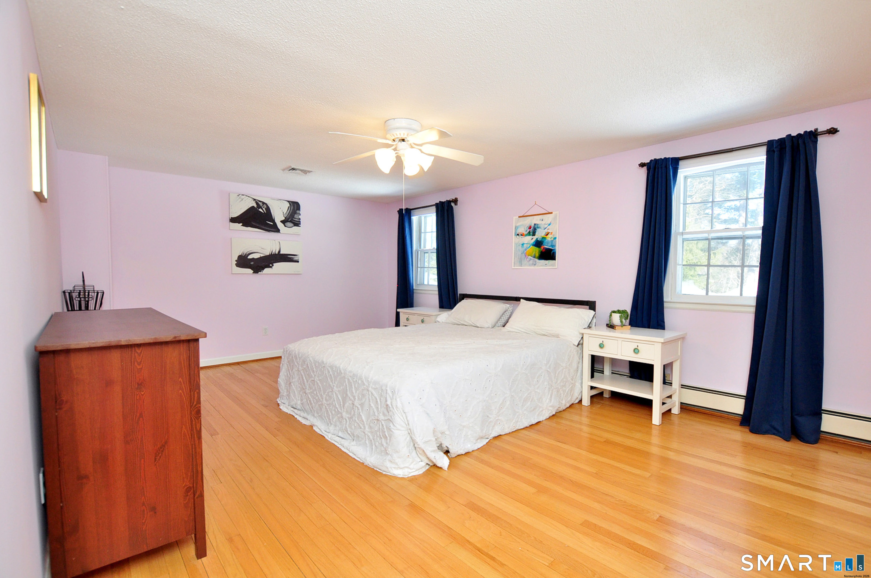 90 Seminary Road Simsbury, CT 06070 - Photo 18 of 34 a bedroom with a large bed and a window