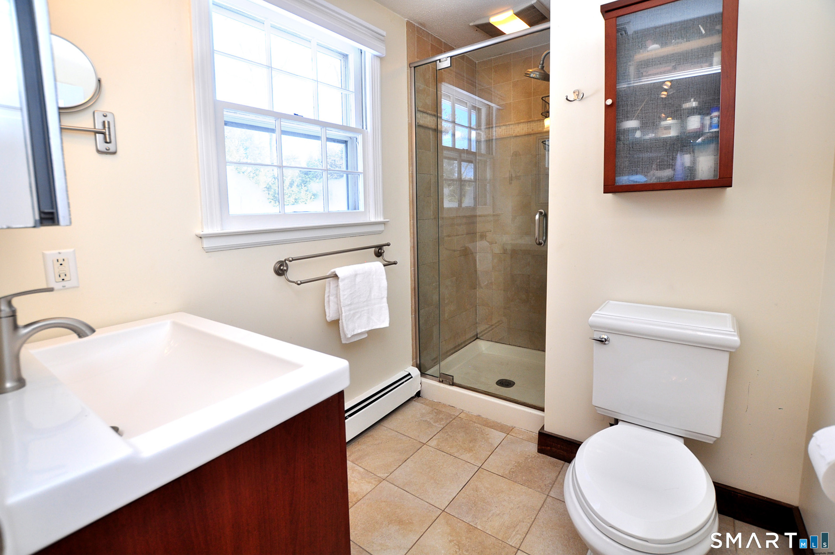 90 Seminary Road Simsbury, CT 06070 - Photo 20 of 34 a bathroom with a sink a toilet and shower