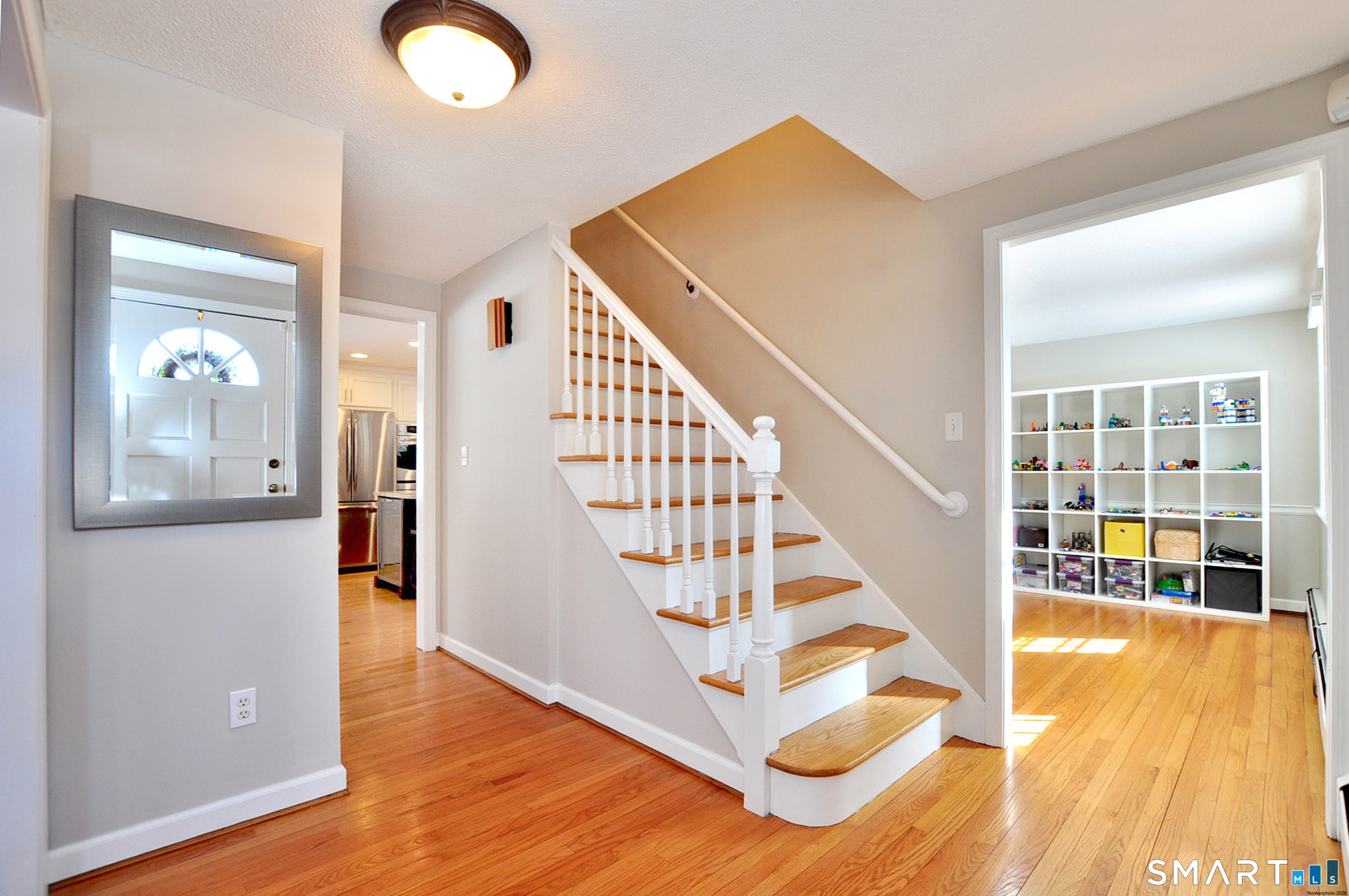 90 Seminary Road Simsbury, CT 06070 - Photo 2 of 34 a view of entryway and hall with wooden floor