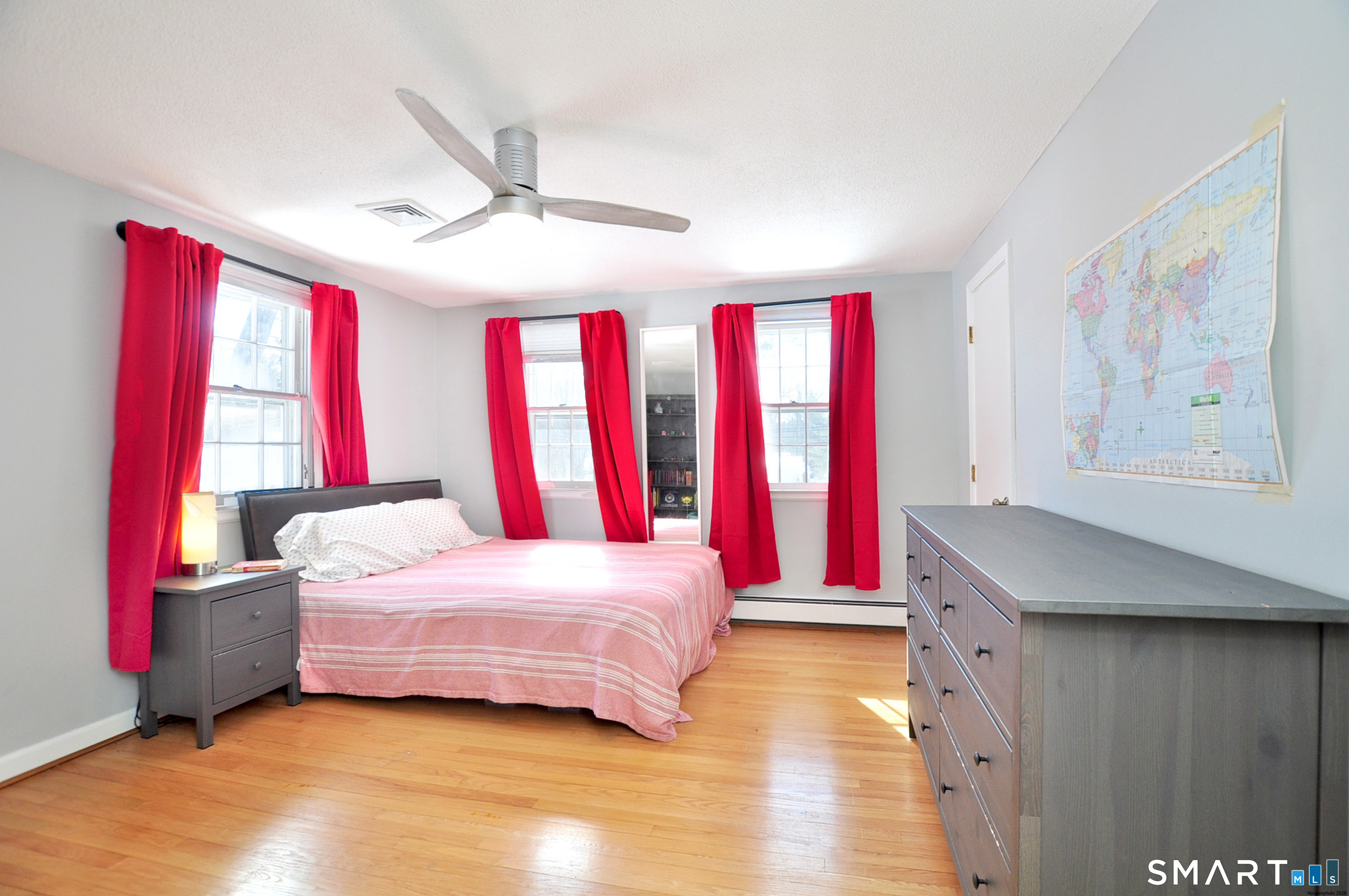 90 Seminary Road Simsbury, CT 06070 - Photo 21 of 34 a bedroom with a bed and a chandelier