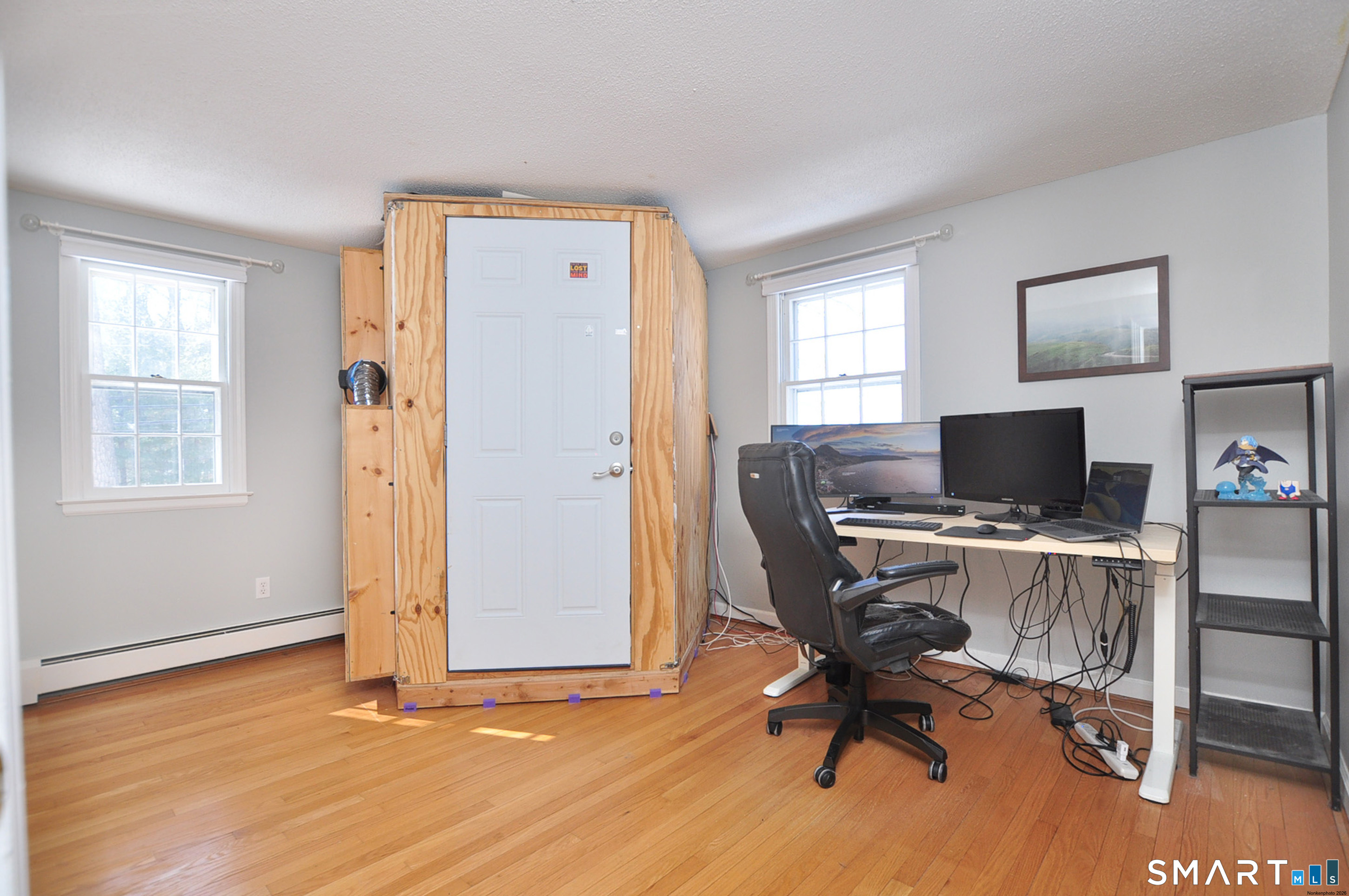 90 Seminary Road Simsbury, CT 06070 - Photo 25 of 34 a workspace with furniture hardwood and a window