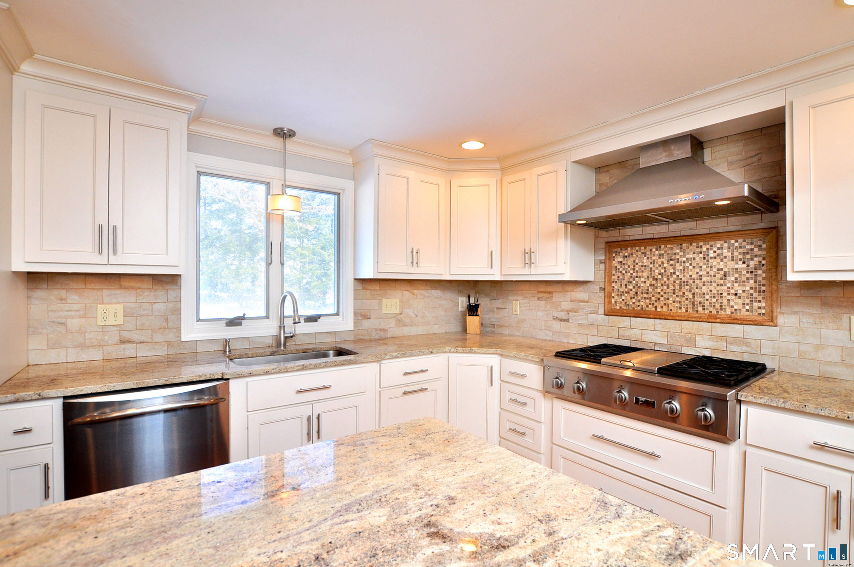 90 Seminary Road Simsbury, CT 06070 - Photo 29 of 34 a kitchen with stainless steel appliances granite countertop a stove a sink and a microwave