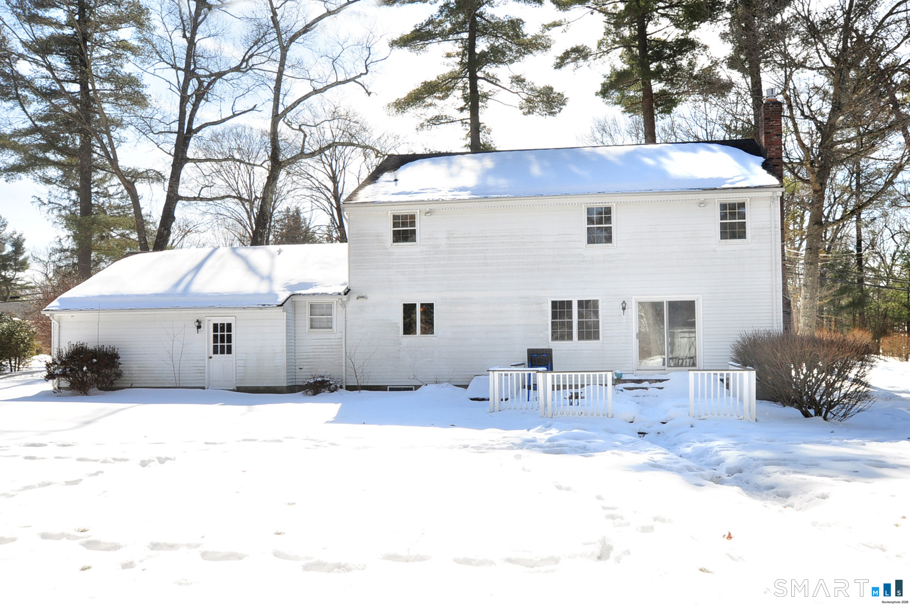 90 Seminary Road Simsbury, CT 06070 - Photo 34 of 34 a backyard of a house with table and chairs