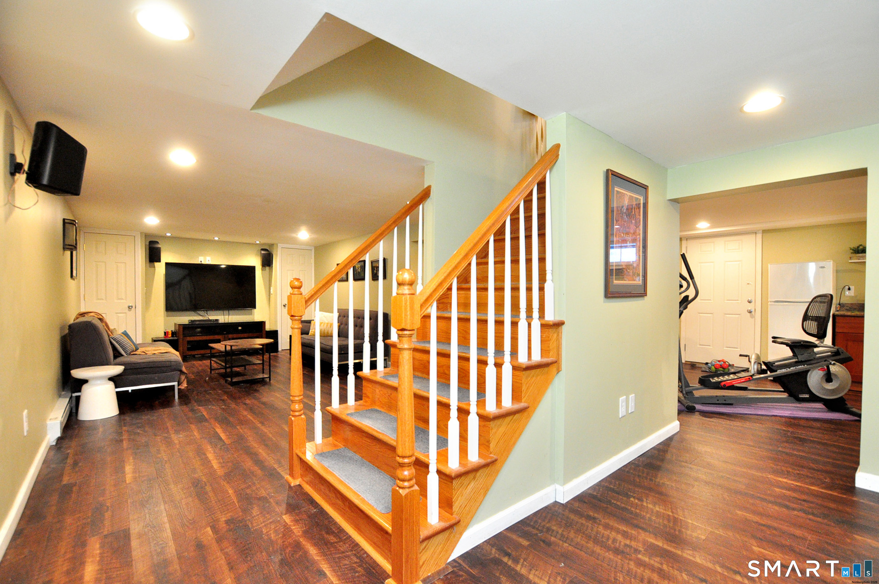 90 Seminary Road Simsbury, CT 06070 - Photo 4 of 34 a living room with furniture and a flat screen tv