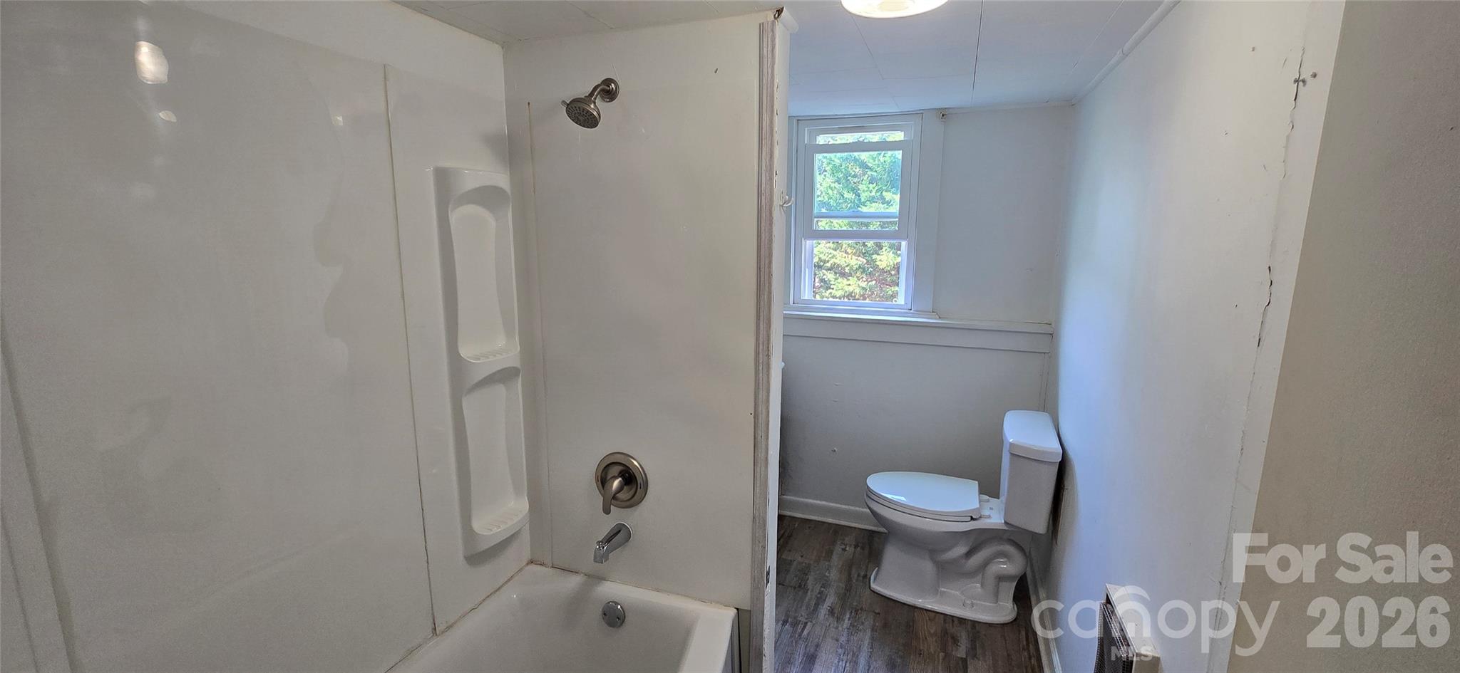 4169 Grace Chapel Road Granite Falls, NC 28630 - Photo 14 of 31 a bathroom with a toilet and a shower