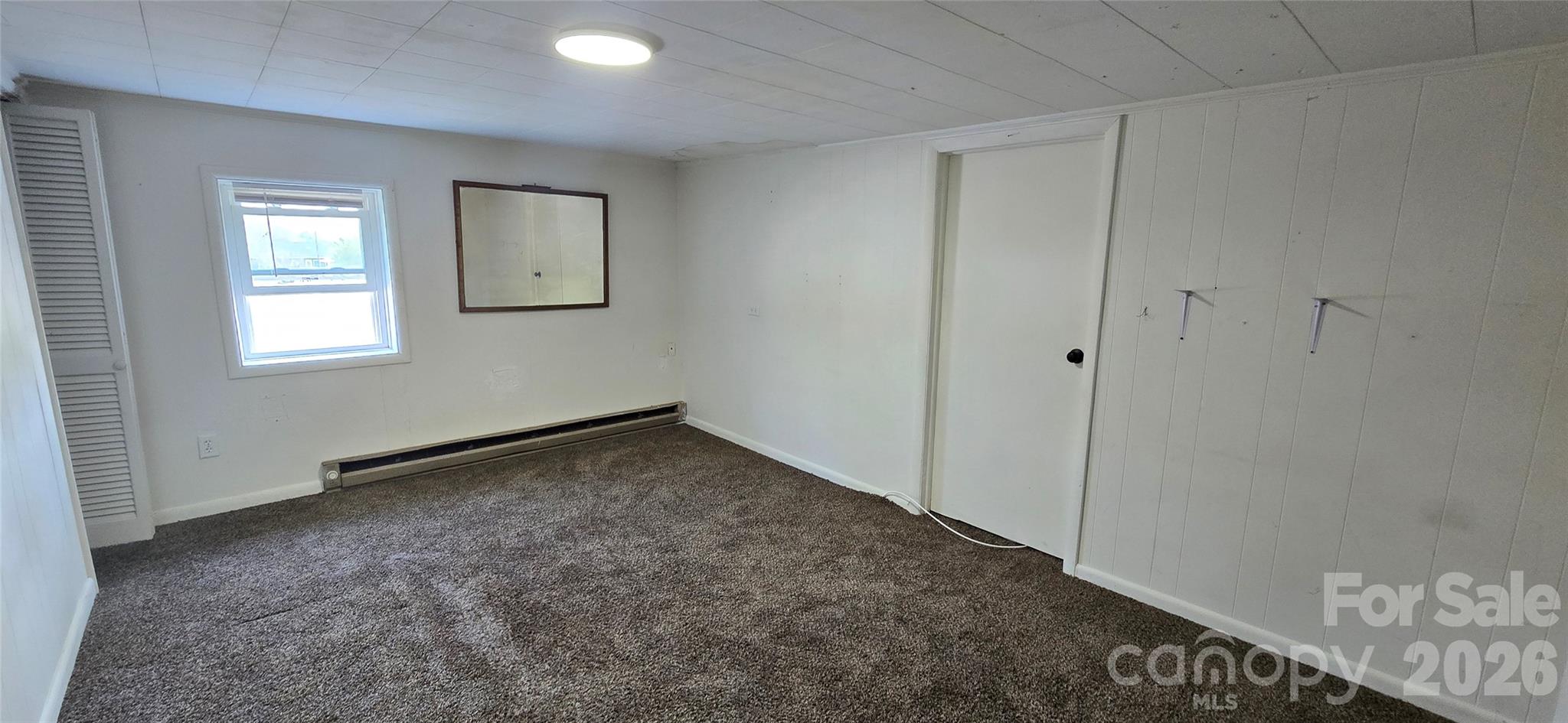 4169 Grace Chapel Road Granite Falls, NC 28630 - Photo 20 of 31 a view of empty room with window