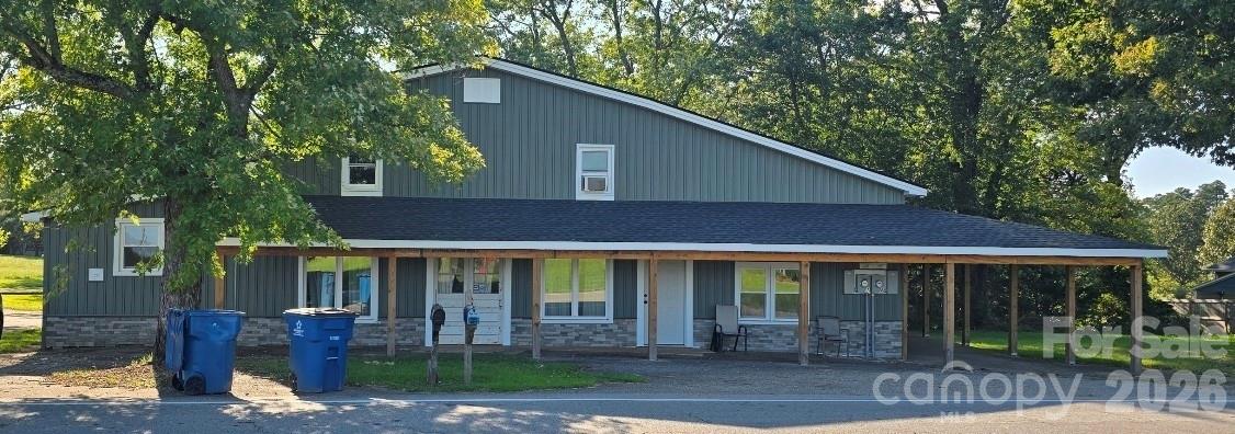 4169 Grace Chapel Road Granite Falls, NC 28630 - Photo 25 of 31 a front view of a house with garden