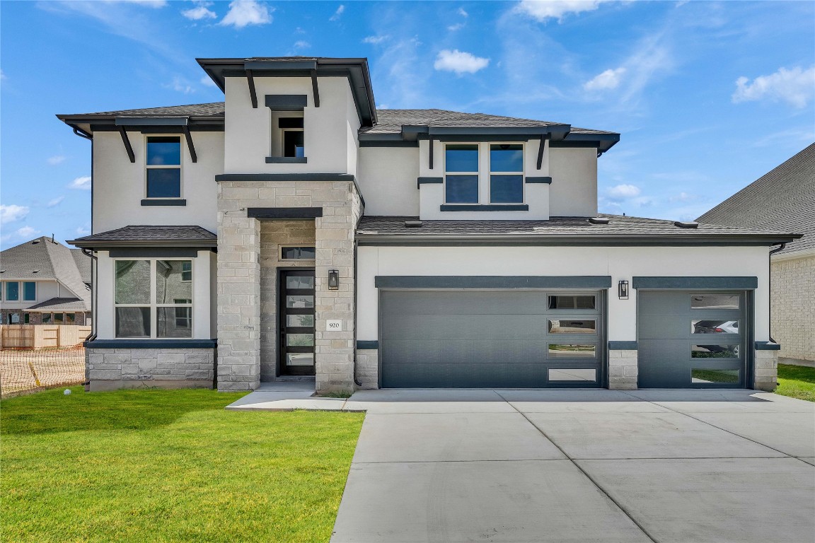 a house view with a garden space