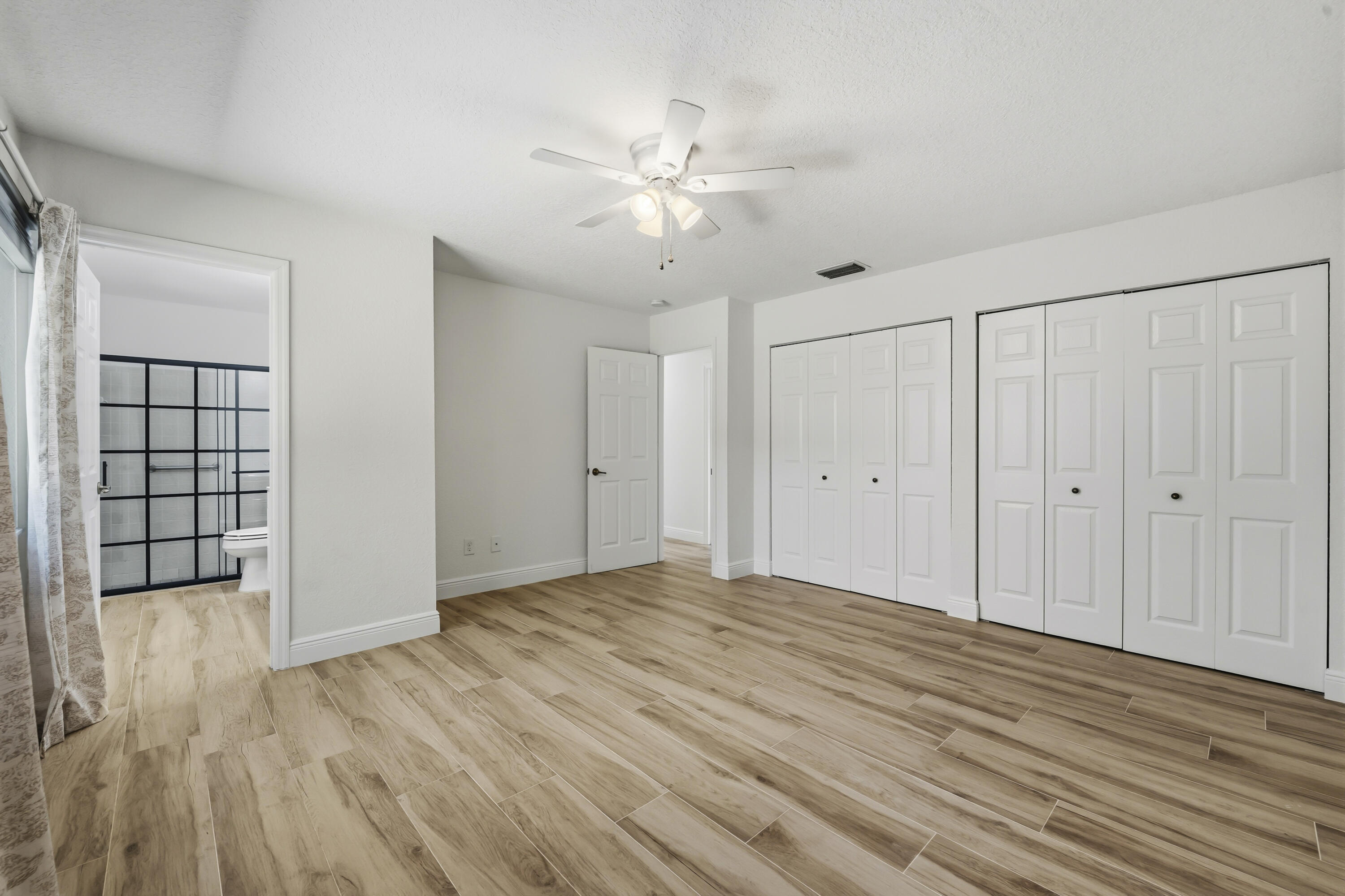 2225 Southeast Flanders Road Port St. Lucie, FL 34952 - Photo 24 of 45 Primary Bedroom