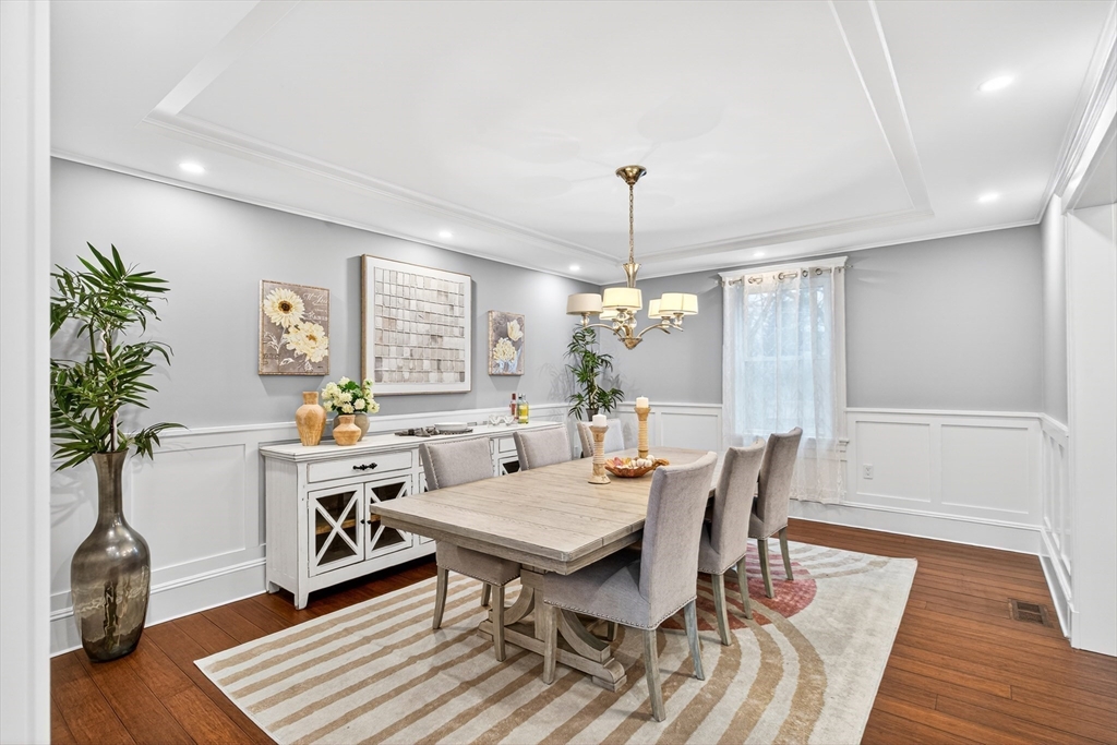524 Ward Street Newton, MA 02459 - Photo 16 of 42 a view of a dining room with furniture window and wooden floor