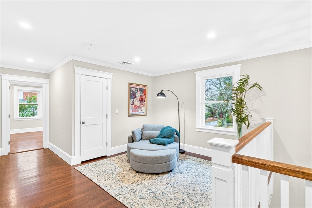524 Ward Street Newton, MA 02459 - Photo 19 of 42 a living room with furniture and a potted plant