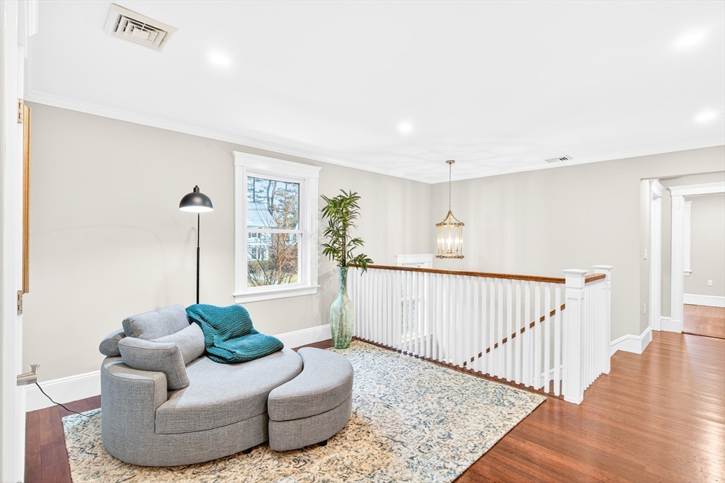 524 Ward Street Newton, MA 02459 - Photo 20 of 42 a living room with furniture and wooden floor