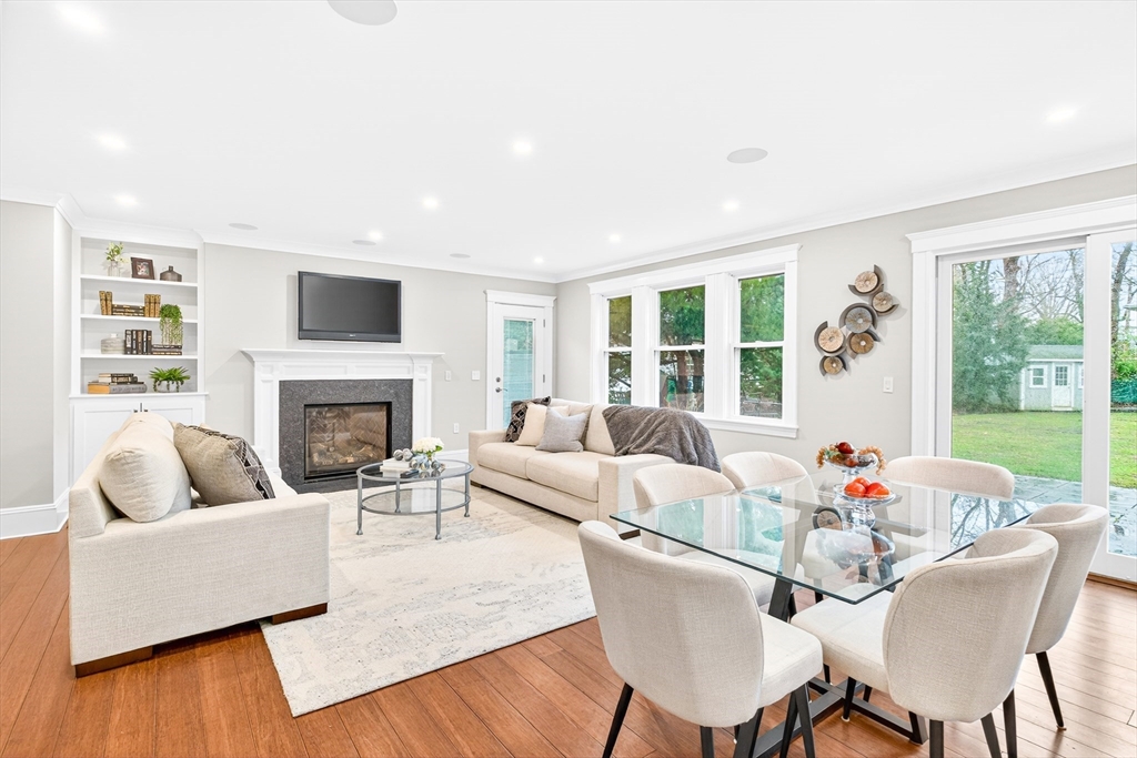 524 Ward Street Newton, MA 02459 - Photo 2 of 42 a living room with furniture fireplace and a large window