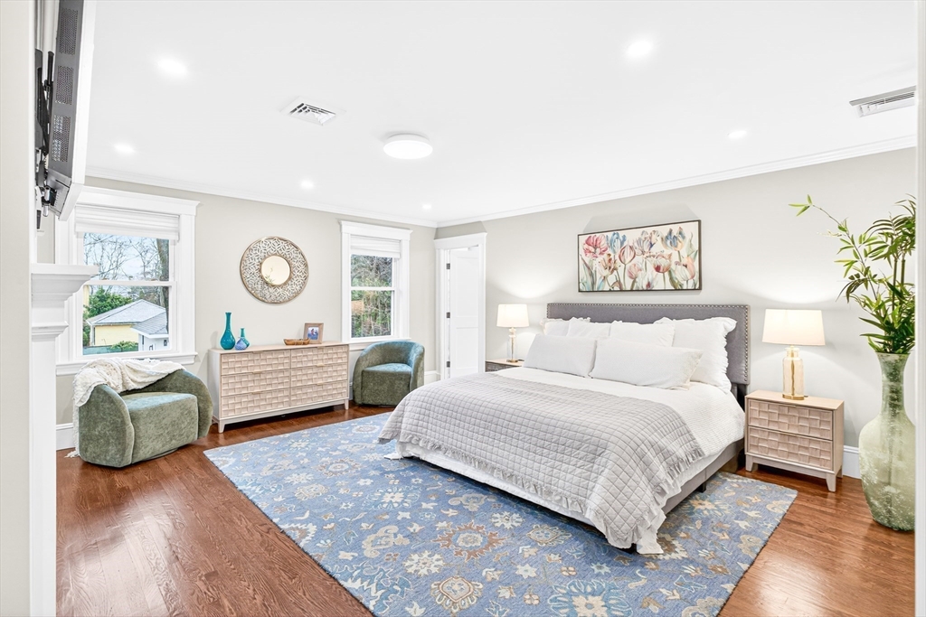 524 Ward Street Newton, MA 02459 - Photo 21 of 42 a bedroom with a bed couch and a window