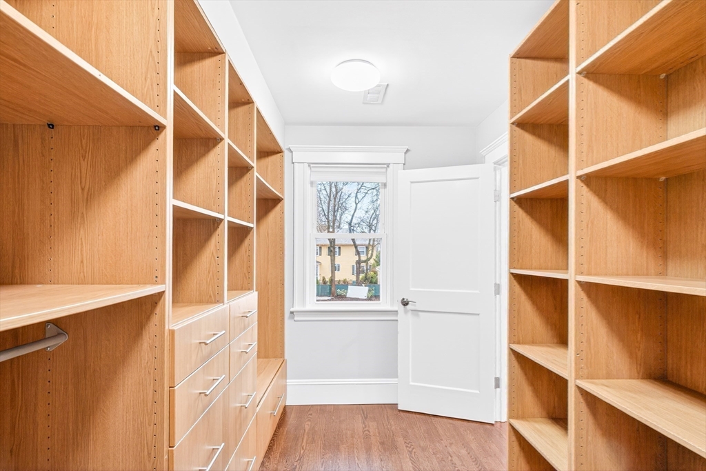 524 Ward Street Newton, MA 02459 - Photo 24 of 42 a view of walk in closet with empty racks
