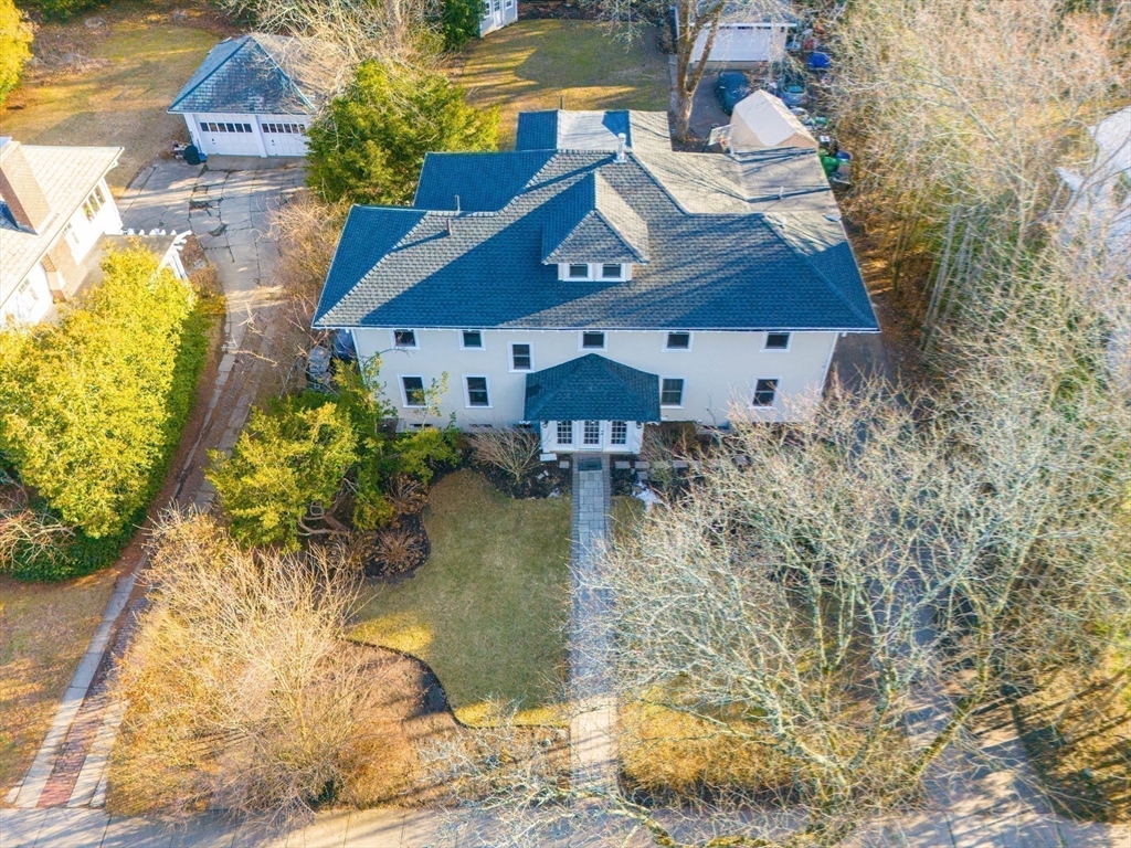 524 Ward Street Newton, MA 02459 - Photo 35 of 42 a aerial view of a house with a yard swimming pool and outdoor seating