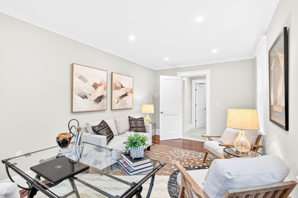524 Ward Street Newton, MA 02459 - Photo 9 of 42 a living room with furniture and a table