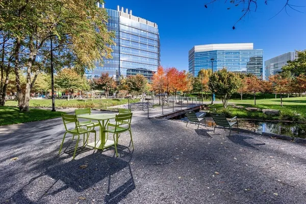 a view of a backyard with sitting area