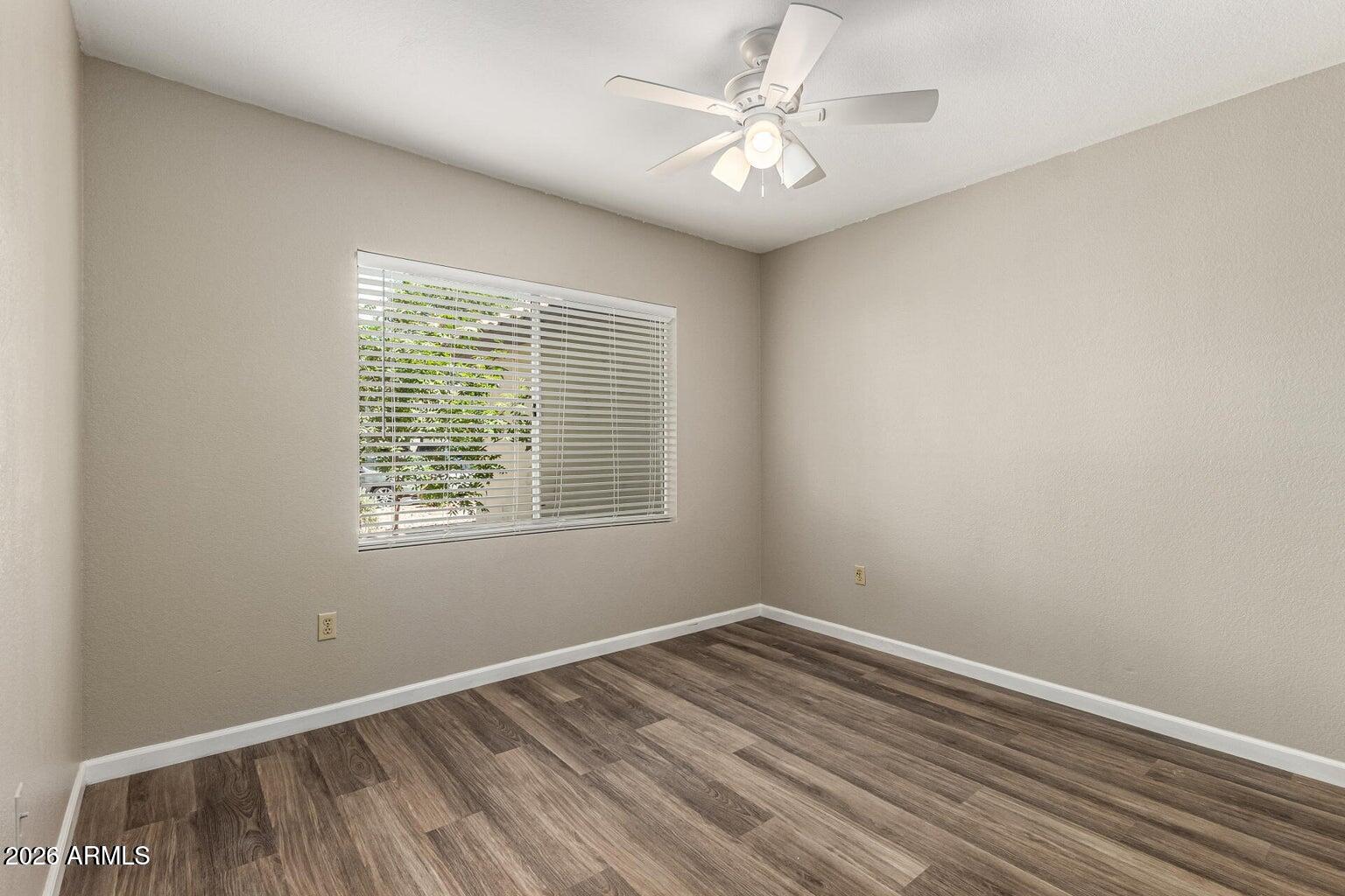 1825 West Ray Road, Unit 1148 Chandler, AZ 85224 - Photo 15 of 36 an empty room with a window