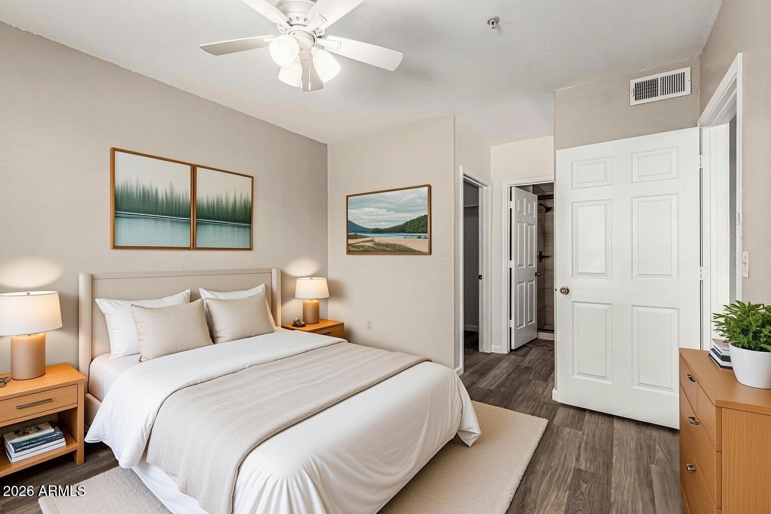 1825 West Ray Road, Unit 1148 Chandler, AZ 85224 - Photo 18 of 36 a bedroom with a bed and a chandelier