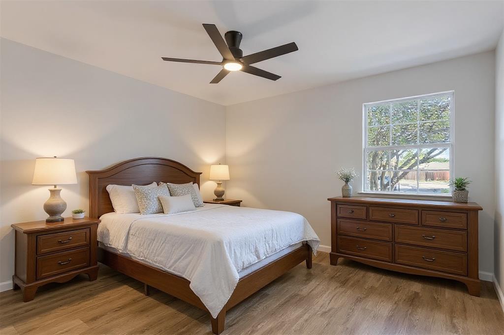 17676 Kelly Boulevard Dallas, TX 75287 - Photo 7 of 18 Gorgeous LVP flooring flows into the primary suite.