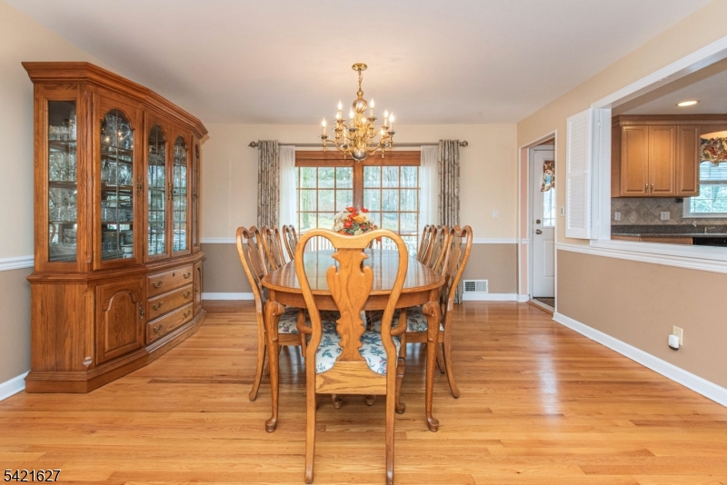 4 Oak Ridge North Caldwell, NJ 07006 - Photo 11 of 33 a view of a dining room with furniture window and wooden floor