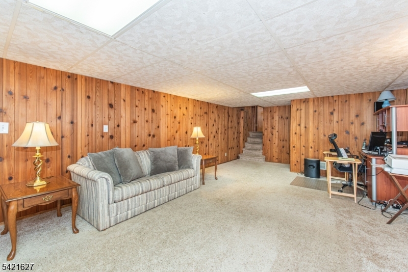 4 Oak Ridge North Caldwell, NJ 07006 - Photo 28 of 33 a living room with furniture and a window