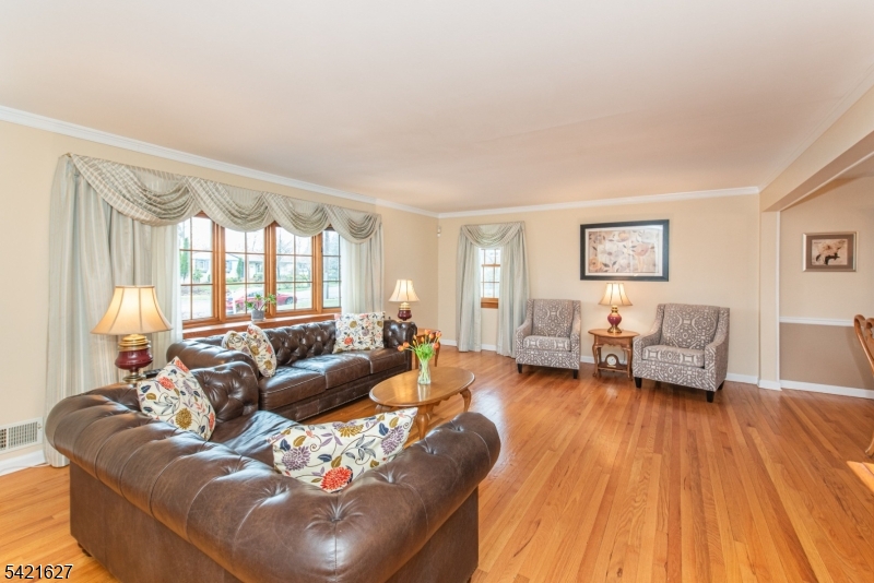 4 Oak Ridge North Caldwell, NJ 07006 - Photo 4 of 33 a living room with furniture and a wooden floor