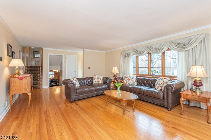 4 Oak Ridge North Caldwell, NJ 07006 - Photo 5 of 33 a living room with furniture and a wooden floor