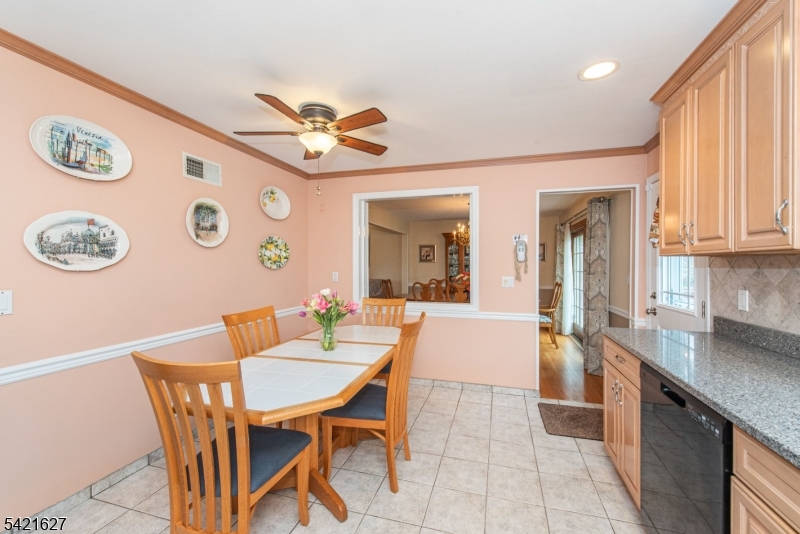 4 Oak Ridge North Caldwell, NJ 07006 - Photo 10 of 33 a view of a dining room with furniture and a large window
