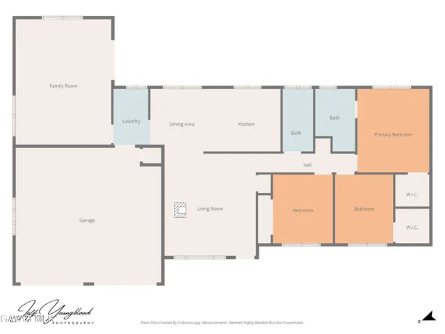 a view of a backyard with large tree