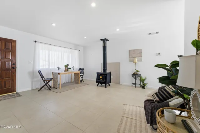 a living room with furniture and a couch
