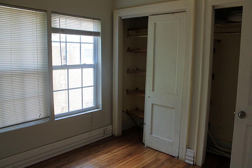 2908 Truxillo Street Houston, TX 77004 - Photo 9 of 12 an empty room with wooden floor and windows