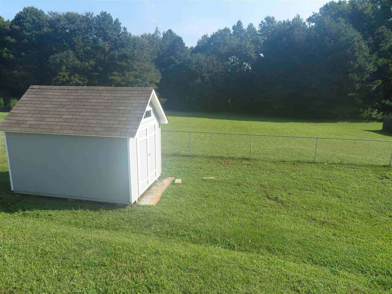 1872 Jack Road Clayton, NC 27520 - Photo 28 of 29 Storage Building and Fenced Yard