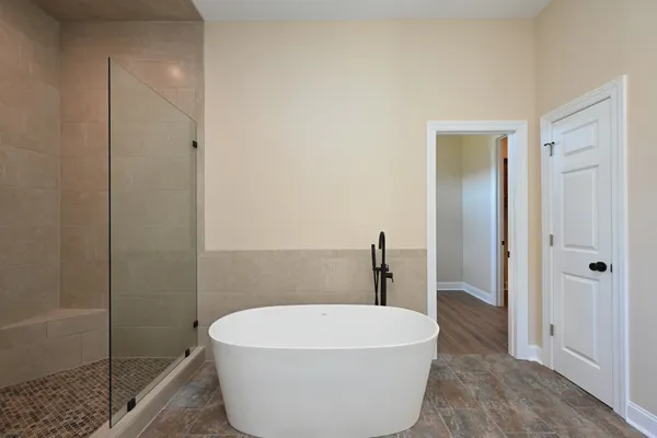 a white toilet sitting next to a bathroom sink